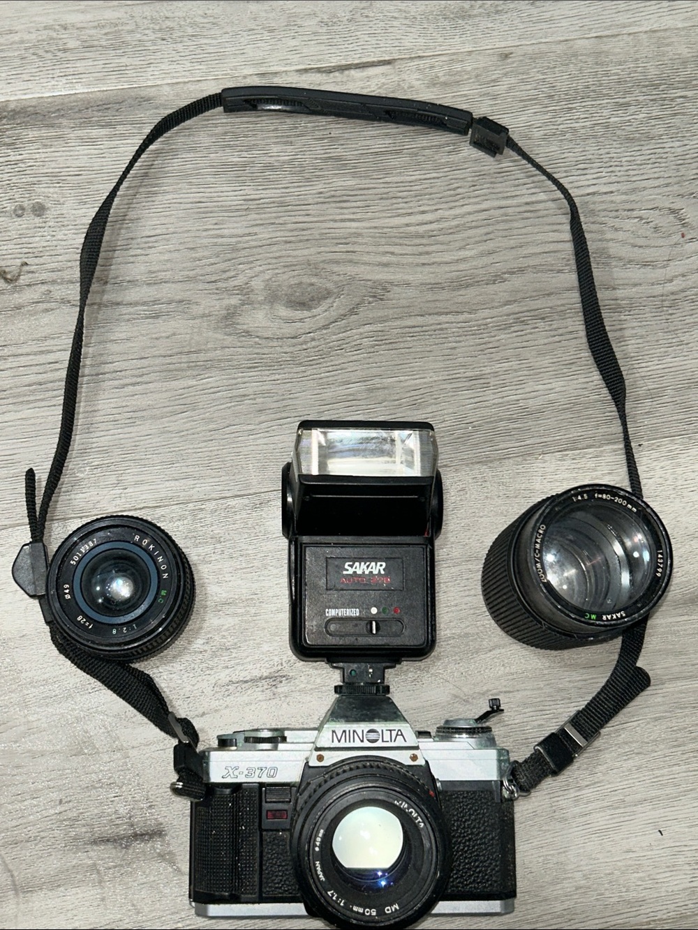 Vintage X-370 35mm Film Minolta Camera with Sakar Black Flash and Lenses - Black